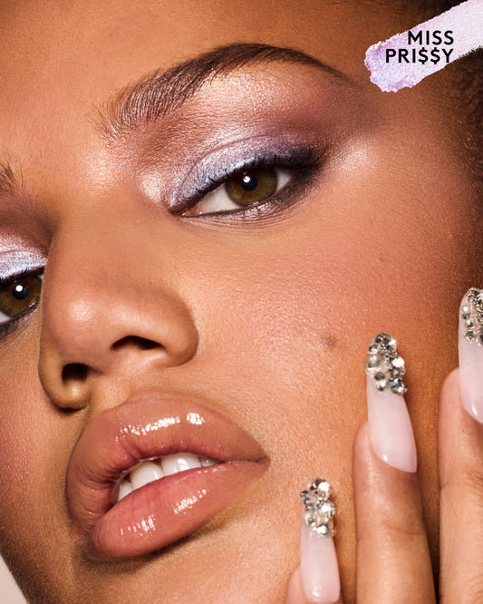 Model wearing Shadowstix Diamonds Diamond Veil Eyeshadow Sticks in shade Miss Prissy.