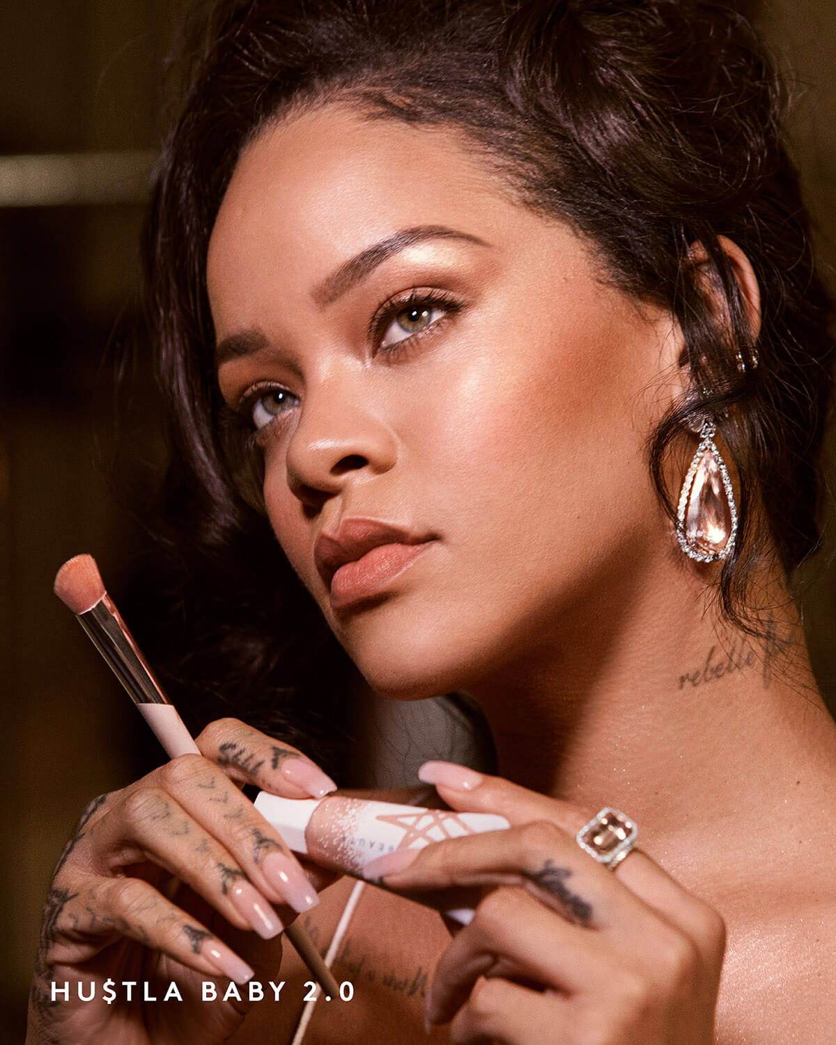 Rihanna wearing Fenty Beauty Liquid Killawatt Fluid Freestyle Highlighter