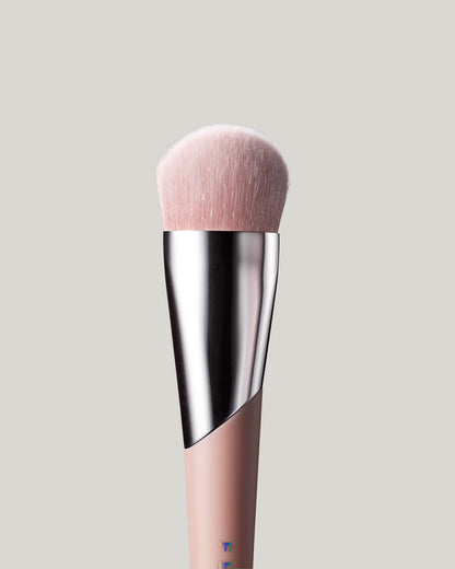 Close-up shot of the Full-Bodied Foundation Brush 110, showcasing its bristles and design in detail.