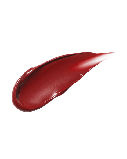 smear of Fenty Beauty Gloss Bomb Cream Color Drip Lip Cream lip gloss shown in shade Fruit Snackz