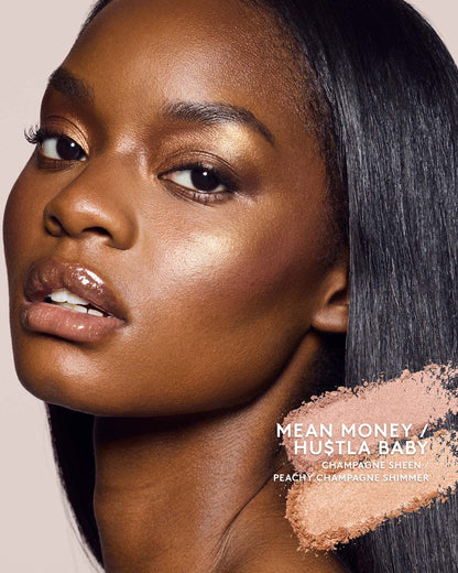 deep skin toned model wearing killawatt freestyle highlighter in shade mean money/hu$tla baby