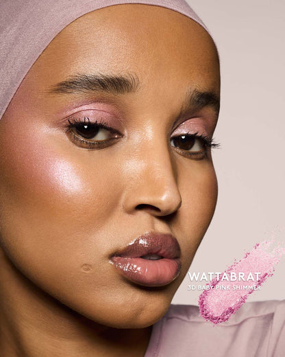 medium skin toned model wearing killawatt freestyle highlighter in shade wattabrat