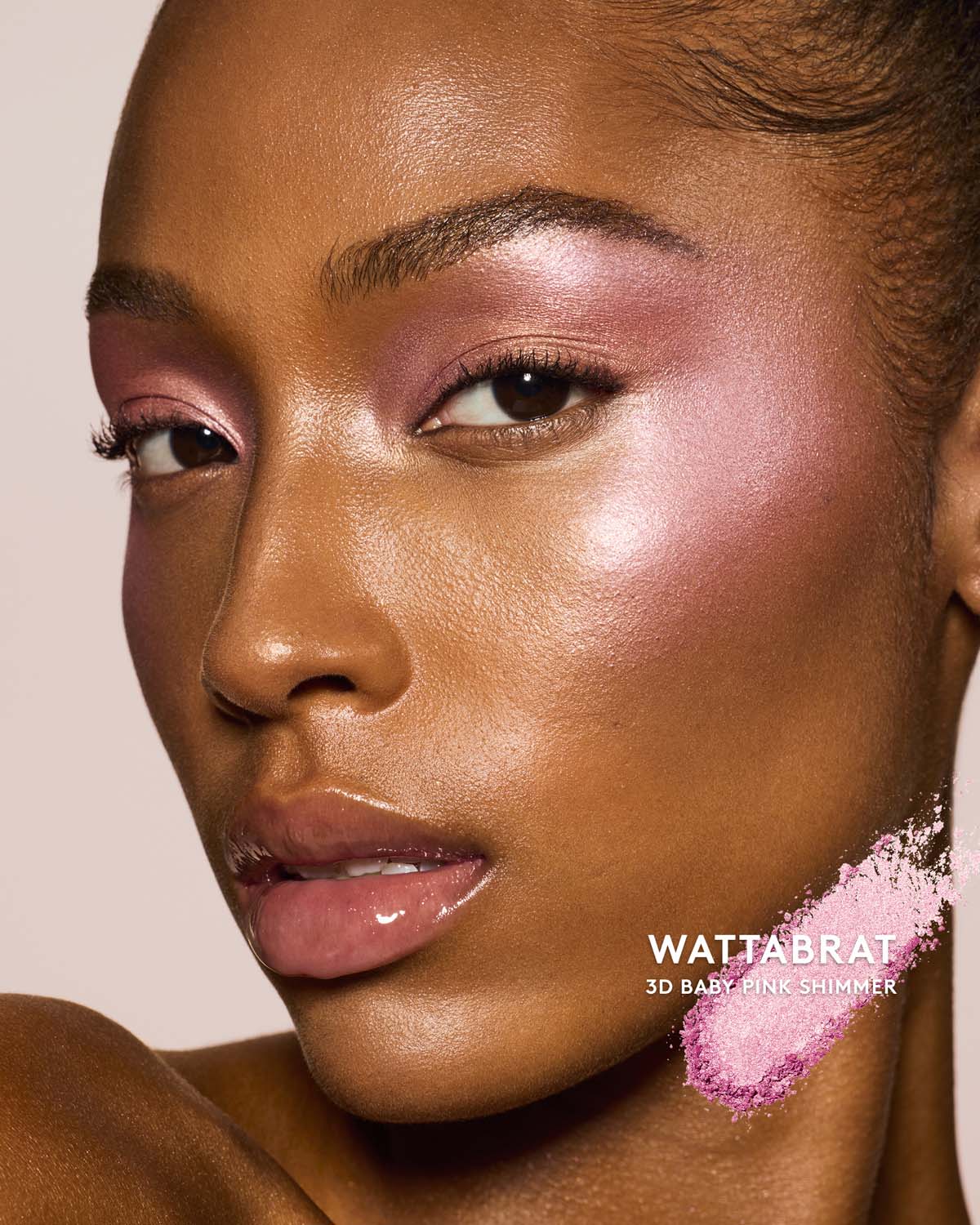 medium skin toned model wearing killawatt freestyle highlighter in shade wattabrat