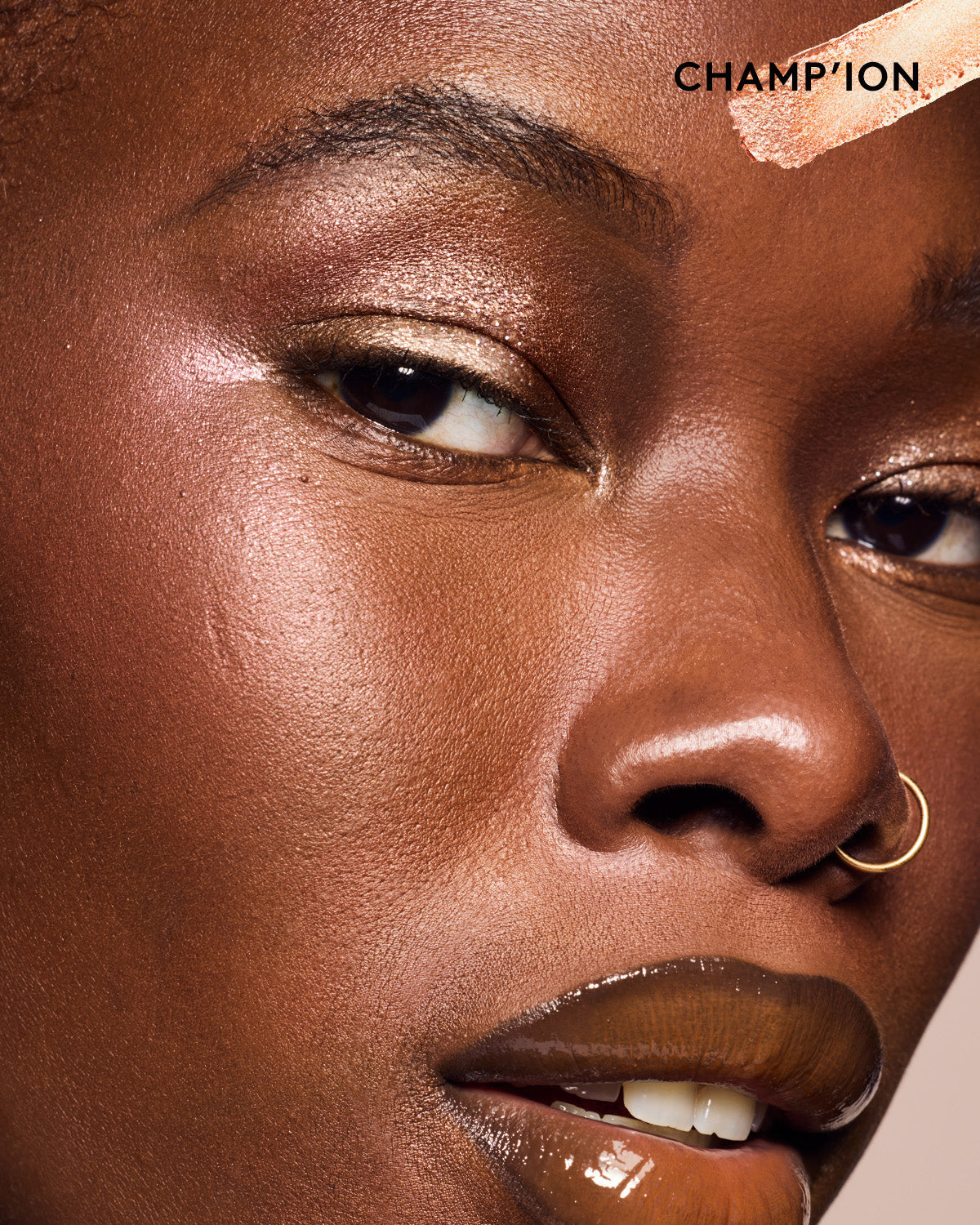 Model wearing Shadowstix Diamonds Diamond Veil Eyeshadow Sticks in shade Champion.