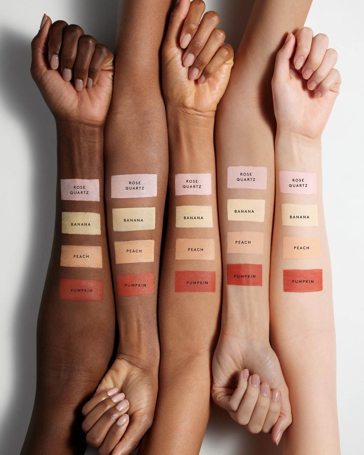 Arm swatch with all four Match Stix Correcting Skinstick on light, light medium, medium, medium deep, and deep skin tones.