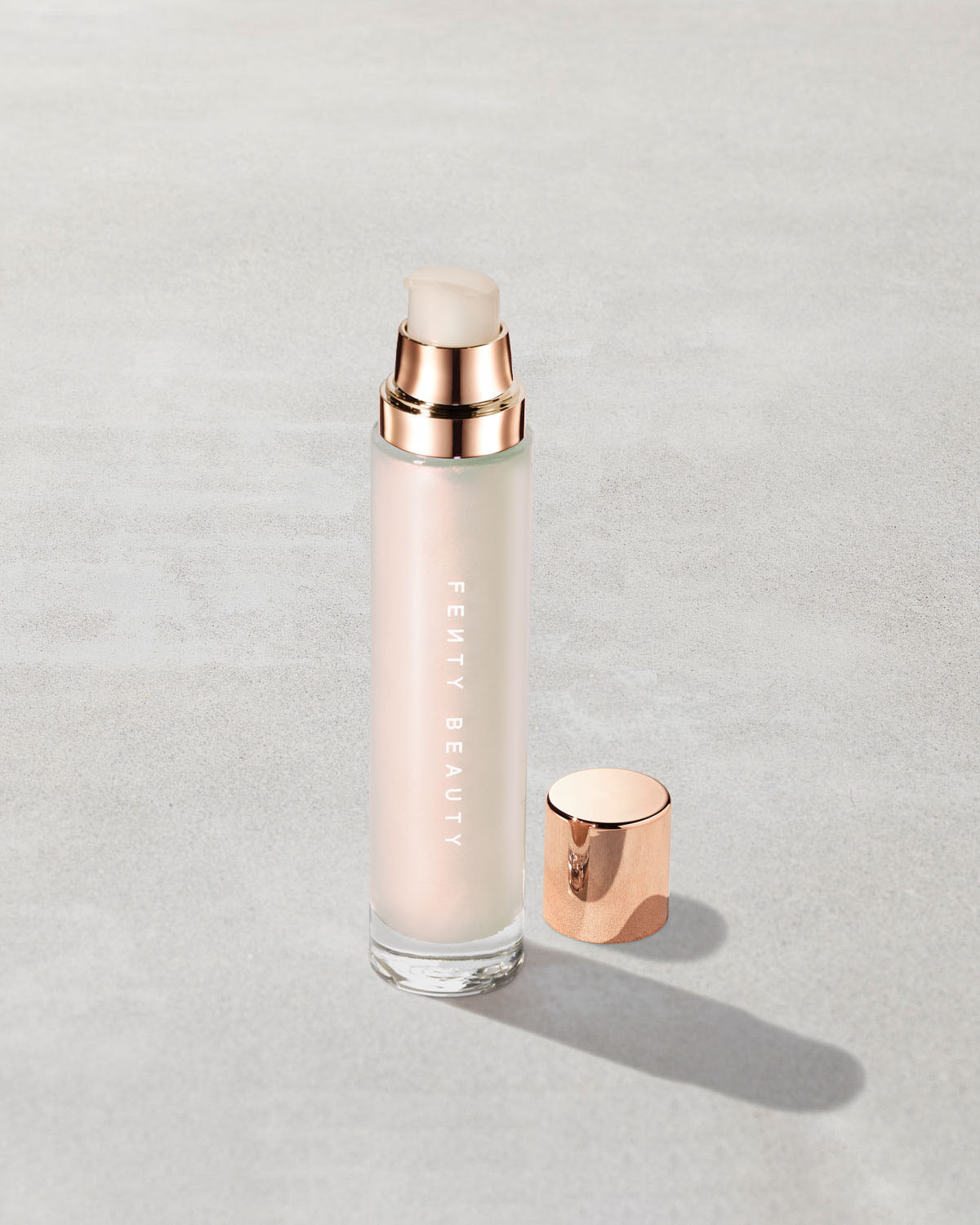 Open product shot of Body Lava Body Luminizer in shade 'Oyster Pearlz'.