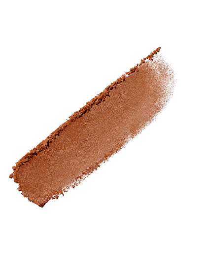 Product smear of Demi'glow Light-Diffusing Highlighter in shade That's RIch on a white background.