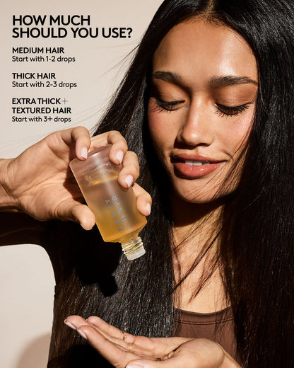 Woman holding a bottle with hair product instructions on usage